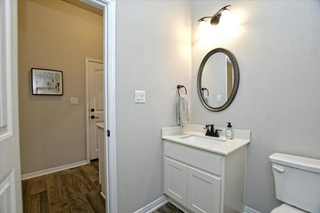 a view of a house with pool and chairs