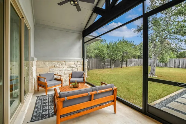 an aerial view of residential houses with outdoor space