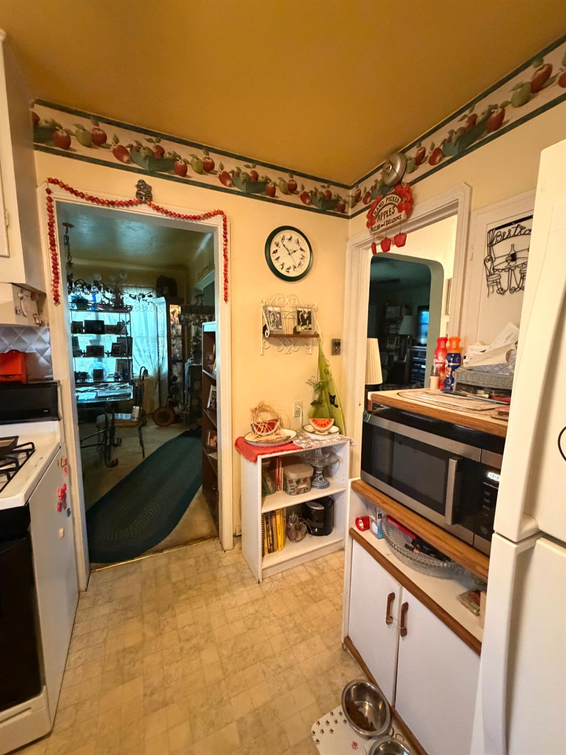 340 Bothun Road Turlock, CA 95380 - Photo 23 of 38 a kitchen with a stove and a refrigerator
