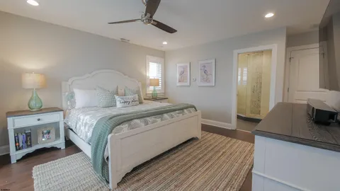 a bedroom with a bed and a walk in closet