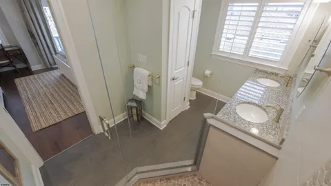 a view of living room with furniture and a window