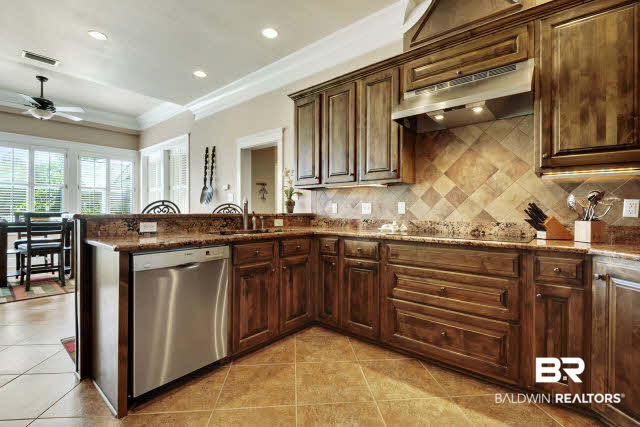 17140 Davis Road Summerdale, AL 36580 - Photo 11 of 33 Beautiful cabinets, granite and back splash! Plenty of storage.