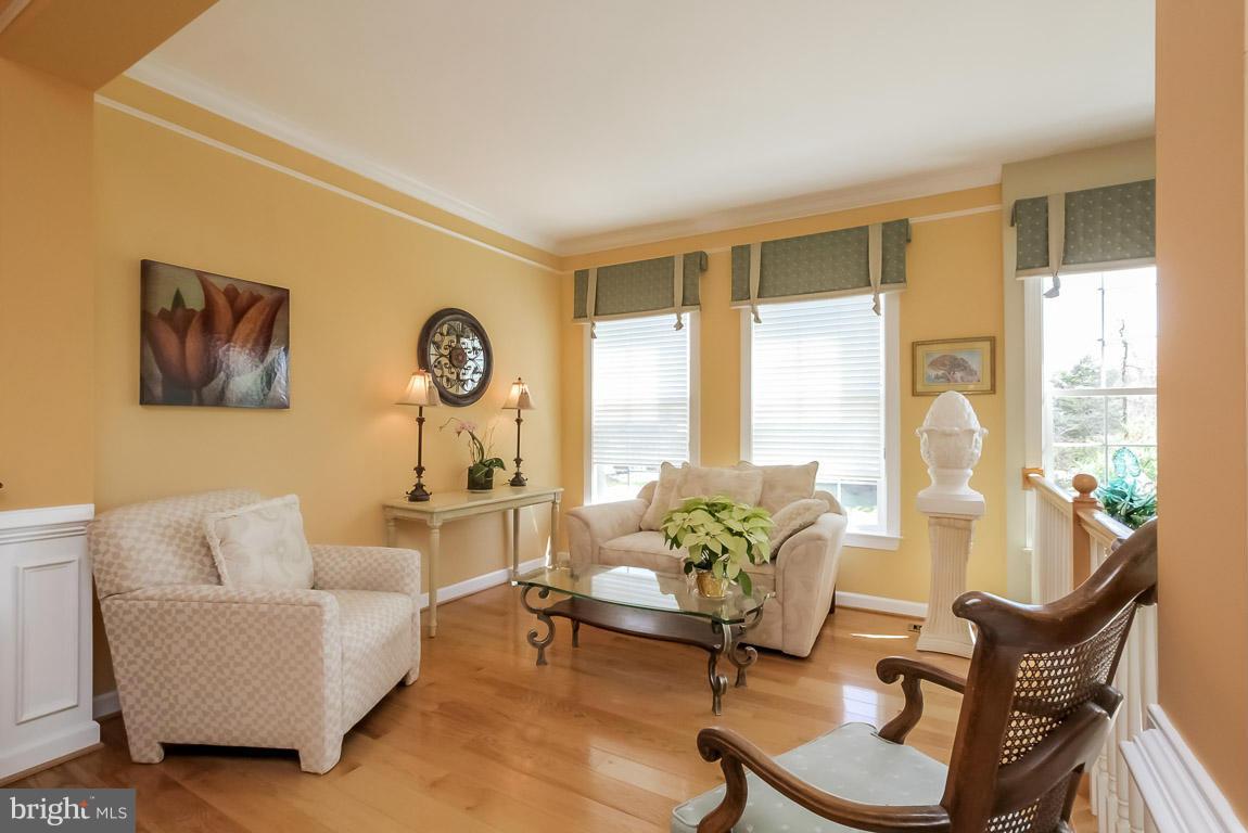 15626 Avocet Loop Woodbridge, VA 22191 - Photo 13 of 30 a living room with furniture and a large window