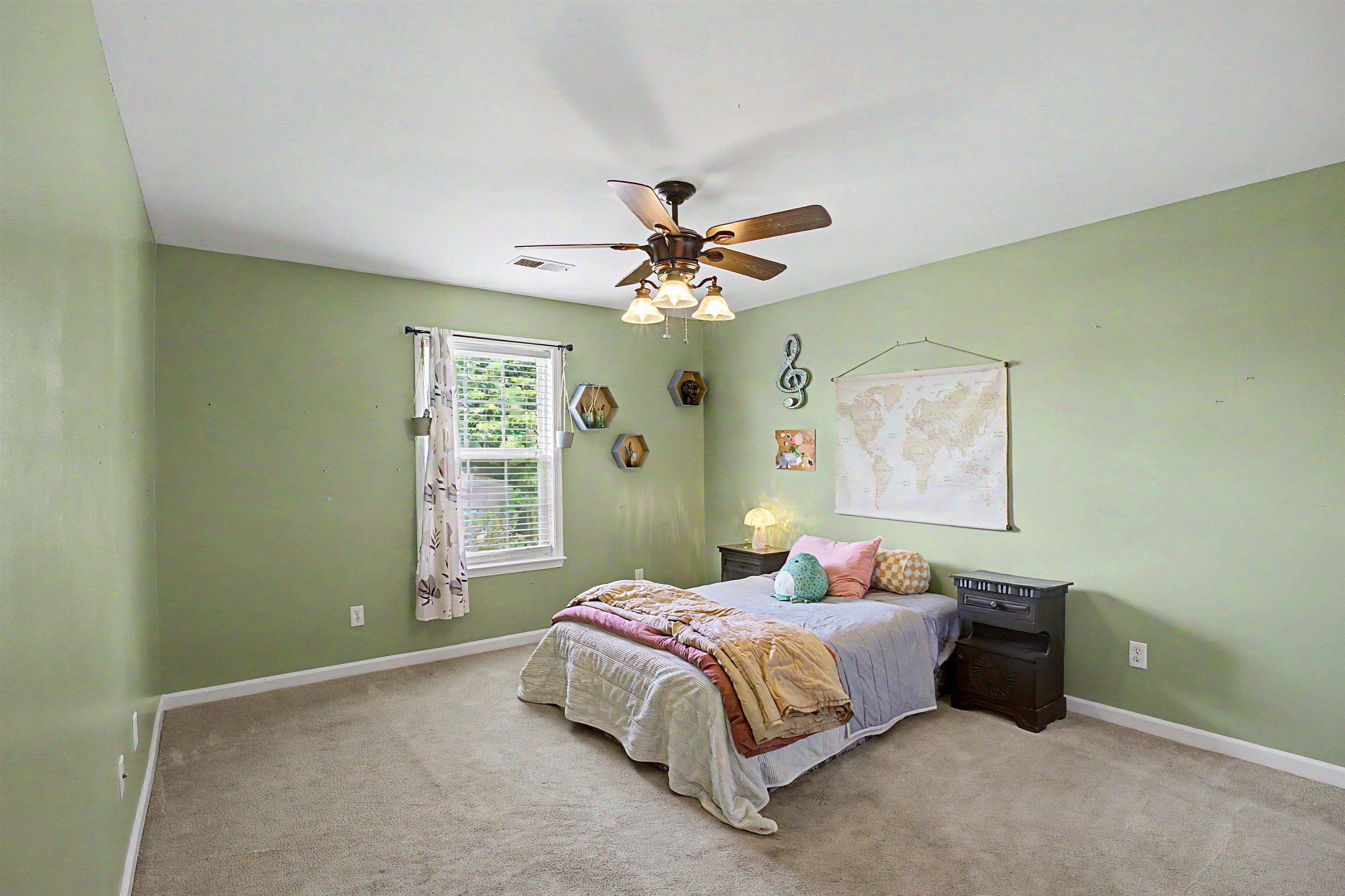 134 Rembert Drive Atoka, TN 38004 - Photo 28 of 38 Carpeted room featuring a ceiling fan with light fixture, a window with blinds, and white baseboards