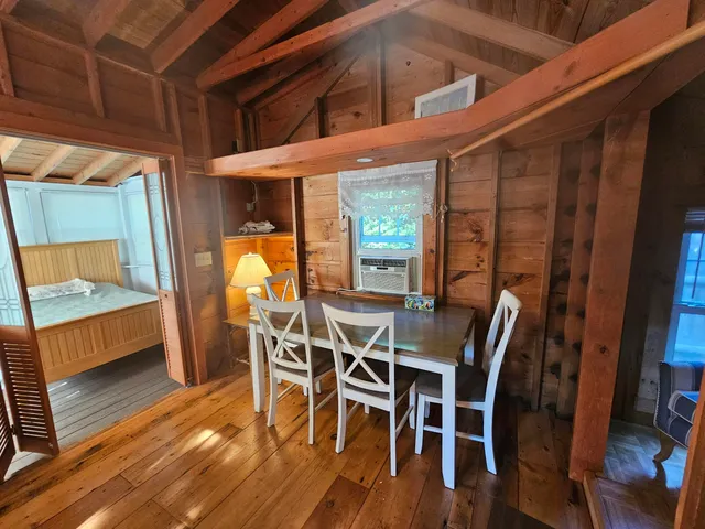 a view of a patio with wooden floor