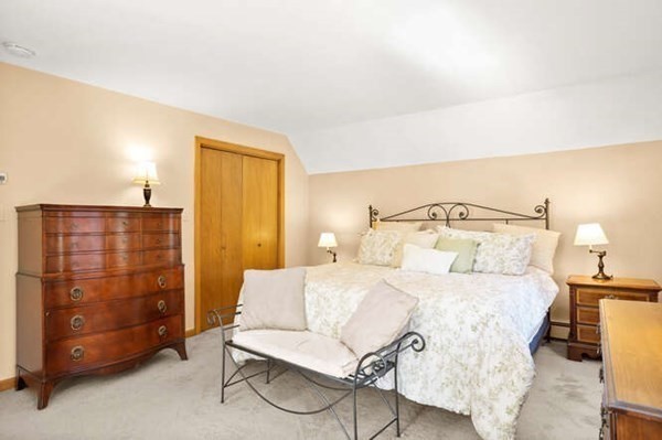 32 Thorpe Road Needham, MA 02494 - Photo 8 of 20 a bedroom with a bed and a night stand