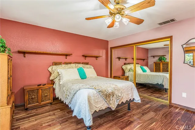 a bathroom with a sink vanity and mirror