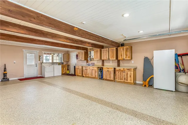 a view of house with swimming pool outdoor seating