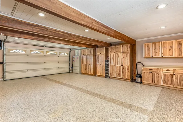 a view of a house with swimming pool and sitting area