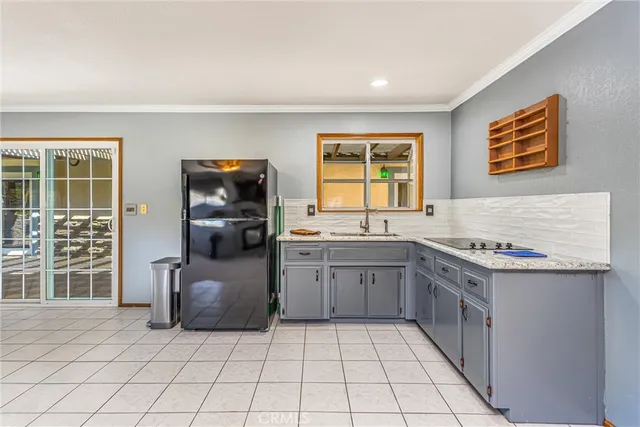 a view of house with outdoor space and swimming pool