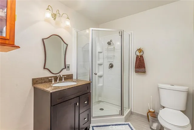 a swimming pool with outdoor seating and yard