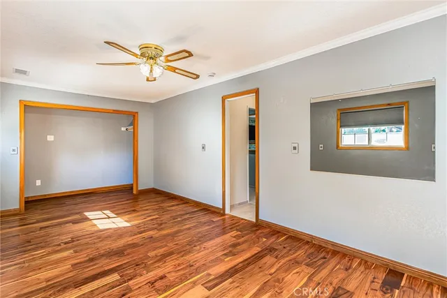a swimming pool with outdoor seating and yard