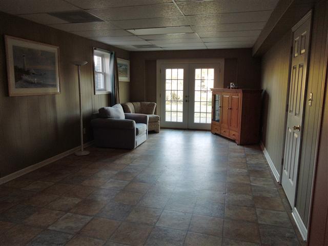 635 Hurricane Loop Tennessee Ridge, TN 37178 - Photo 18 of 20 Lower level family room, French doors out to patio area.