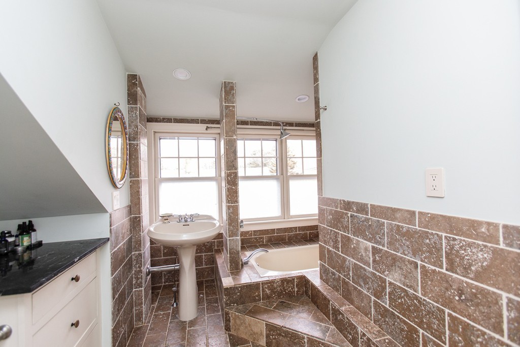 38 Conant Road Weston, MA 02493 - Photo 16 of 19 a living room with a sink and a large window