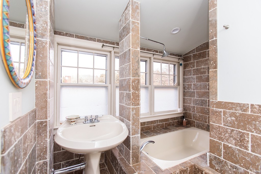 38 Conant Road Weston, MA 02493 - Photo 17 of 19 a bathroom with a sink and a bathtub