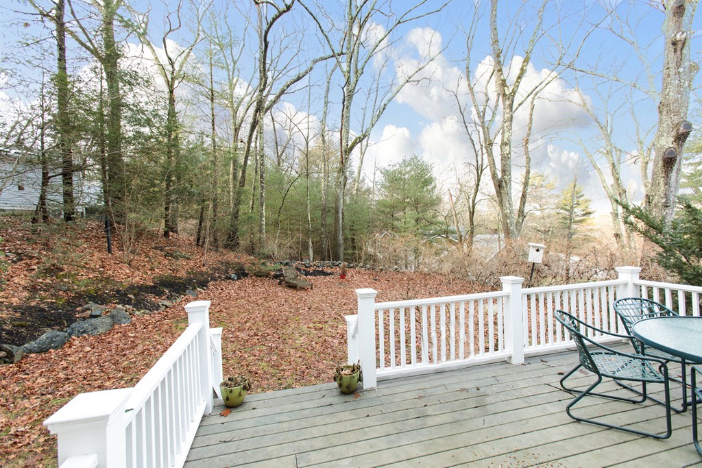 38 Conant Road Weston, MA 02493 - Photo 3 of 19 a view of a wooden deck and outdoor space