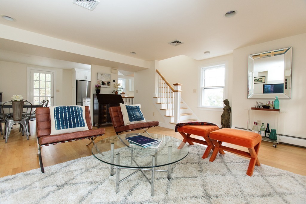 38 Conant Road Weston, MA 02493 - Photo 7 of 19 a living room with furniture and a dining table