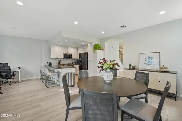 a view of a dining room with furniture
