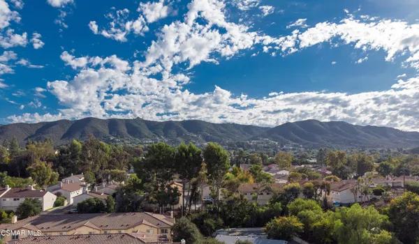 a sign that is sitting on a wall