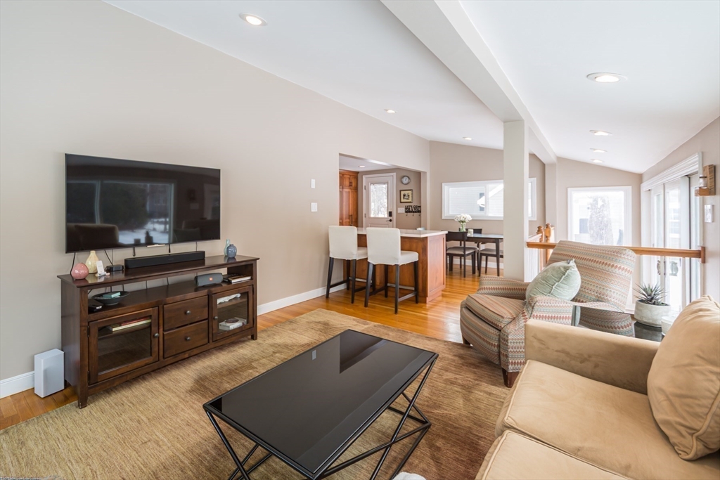 1 Lincoln Street Extension Natick, MA 01760 - Photo 17 of 31 a living room with furniture and a flat screen tv