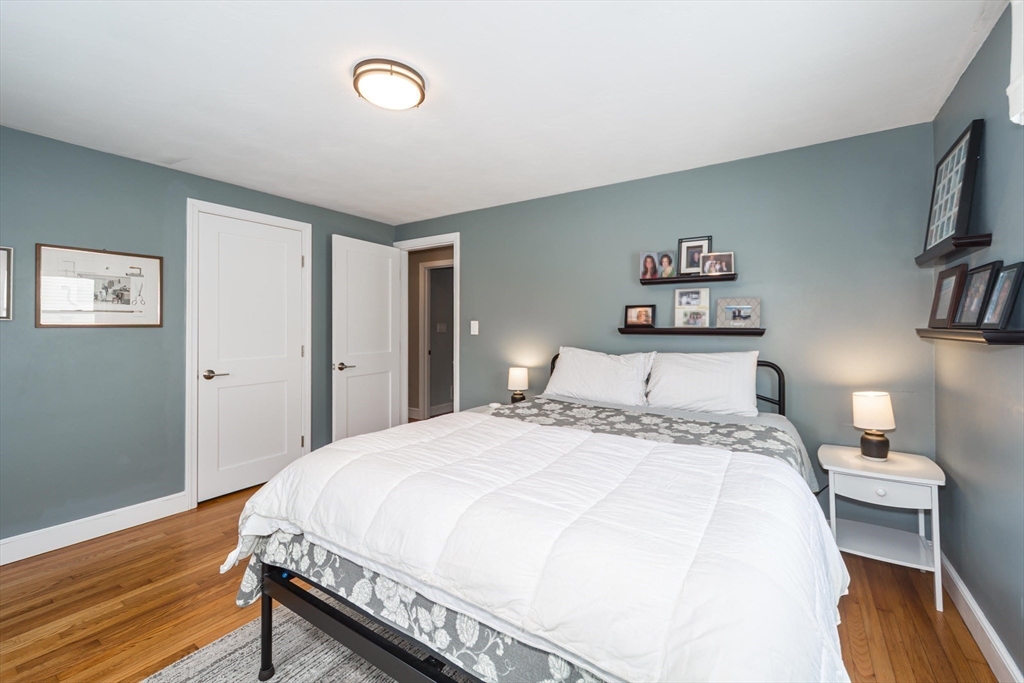 1 Lincoln Street Extension Natick, MA 01760 - Photo 19 of 31 a bedroom with a bed and a desk