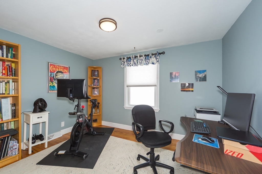 1 Lincoln Street Extension Natick, MA 01760 - Photo 21 of 31 a view of a workspace with furniture and a window