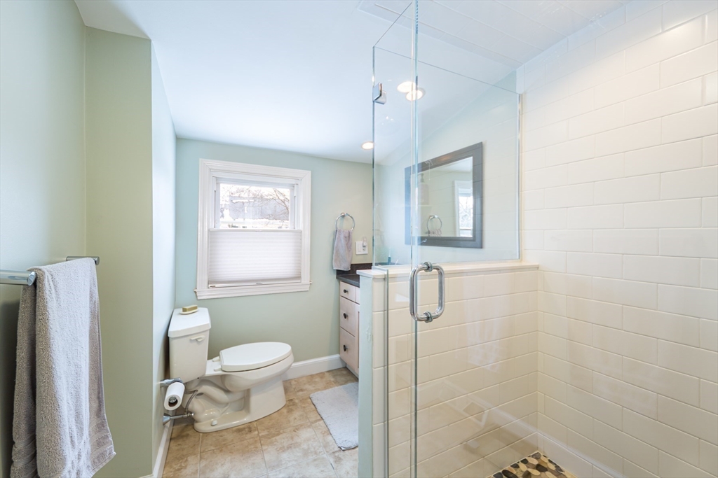 1 Lincoln Street Extension Natick, MA 01760 - Photo 25 of 31 a bathroom with a toilet sink and shower