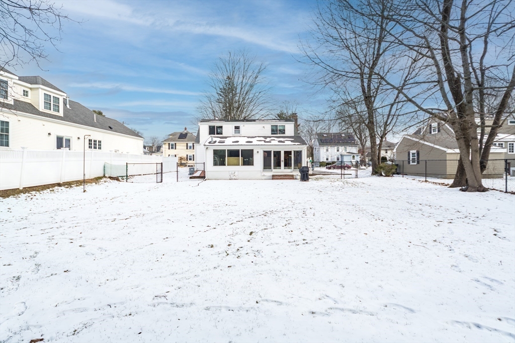 1 Lincoln Street Extension Natick, MA 01760 - Photo 29 of 31 a view of residential houses with snow on the road
