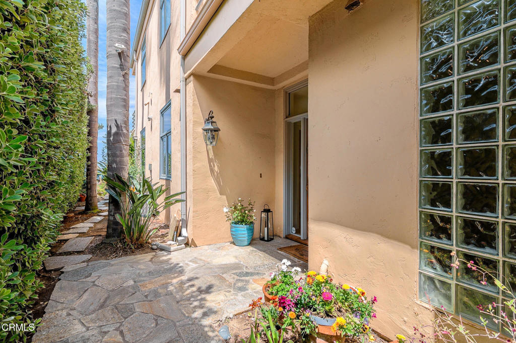 101 Rios Court Solana Beach, CA 92075 - Photo 7 of 67 a view of front door and potted plants
