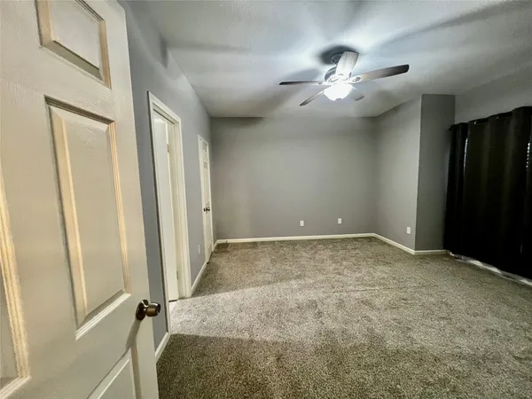 a view of a livingroom with a staircase