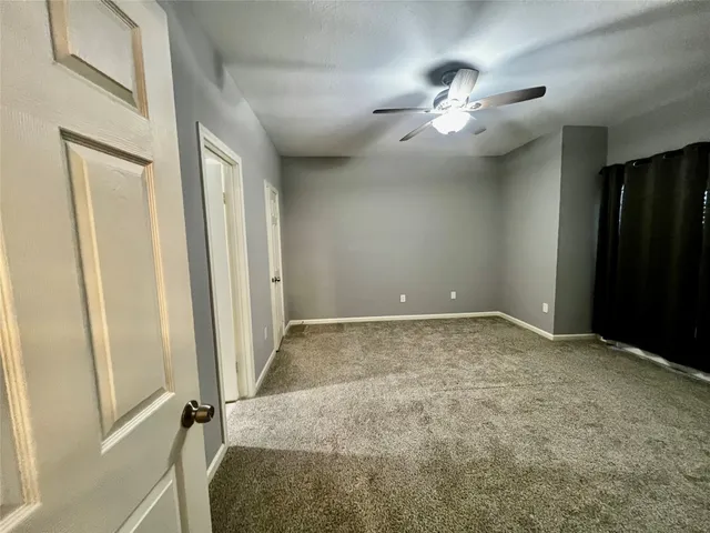 a view of a livingroom with a staircase