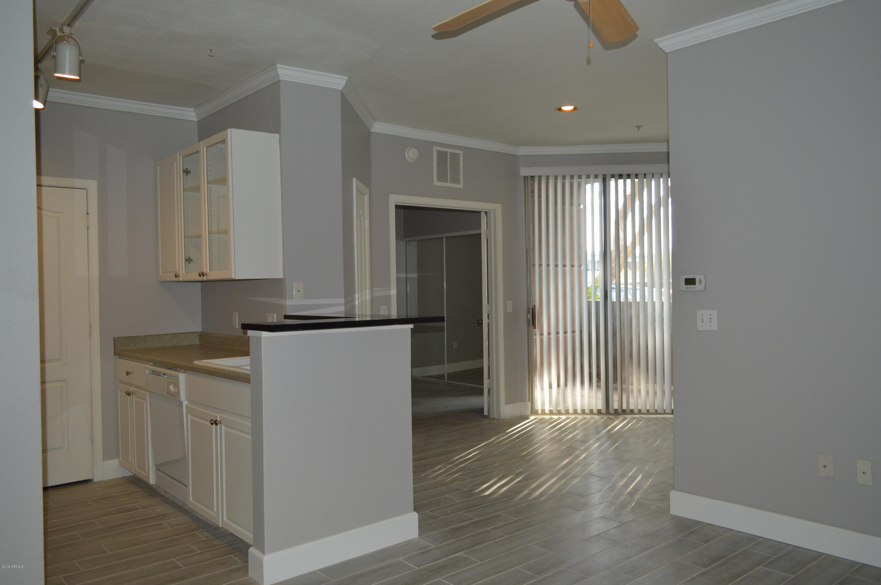 1701 East Colter Street, Unit 184 Phoenix, AZ 85016 - Photo 1 of 41 a view of kitchen with wooden floor