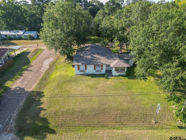 a view of a house with a swimming pool