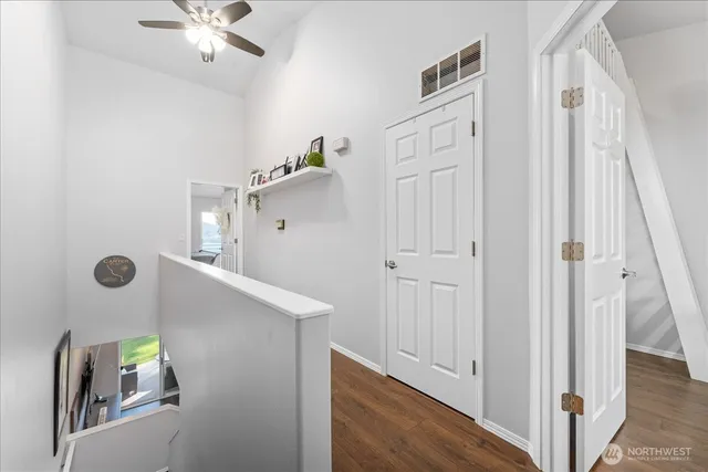 a view of a hallway with front door