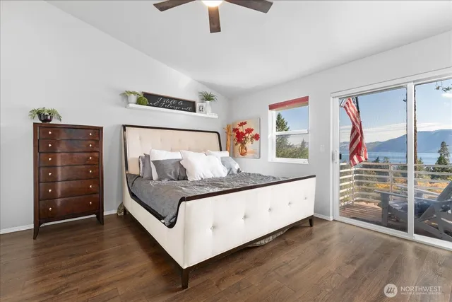 a living room with a bed and furniture