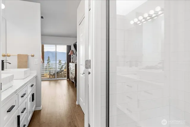 a view of a kitchen from the hallway