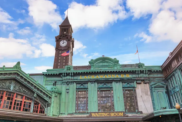 a front view of a building with parking space