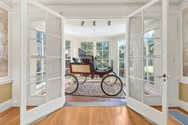 a view of entryway with wooden floor