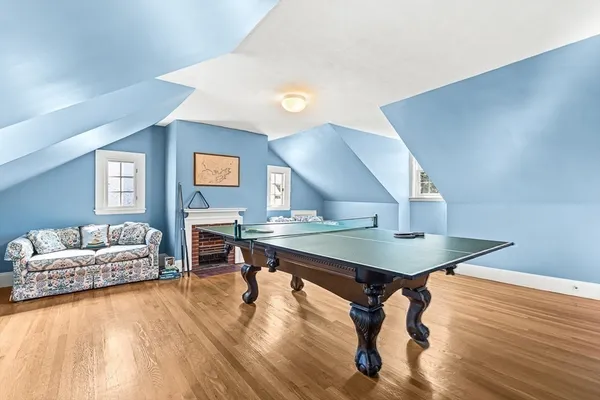 a room with furniture and wooden floor