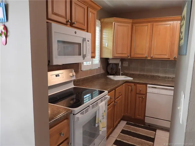 a view of a bathroom from a hallway