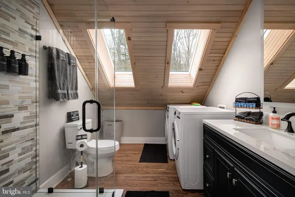 a view of a house with backyard and porch