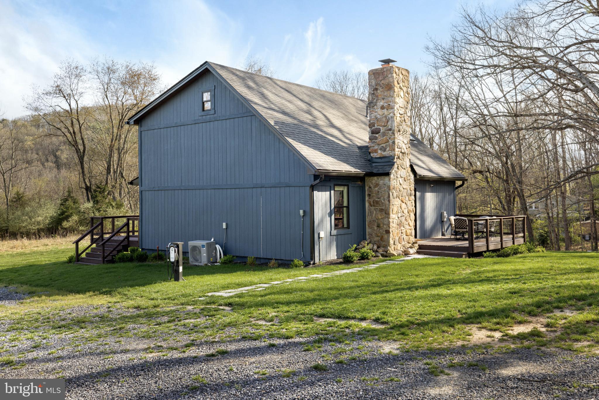 529 Posy Hill Road Lost City, WV 26810 - Photo 38 of 59 a view of a house with a yard