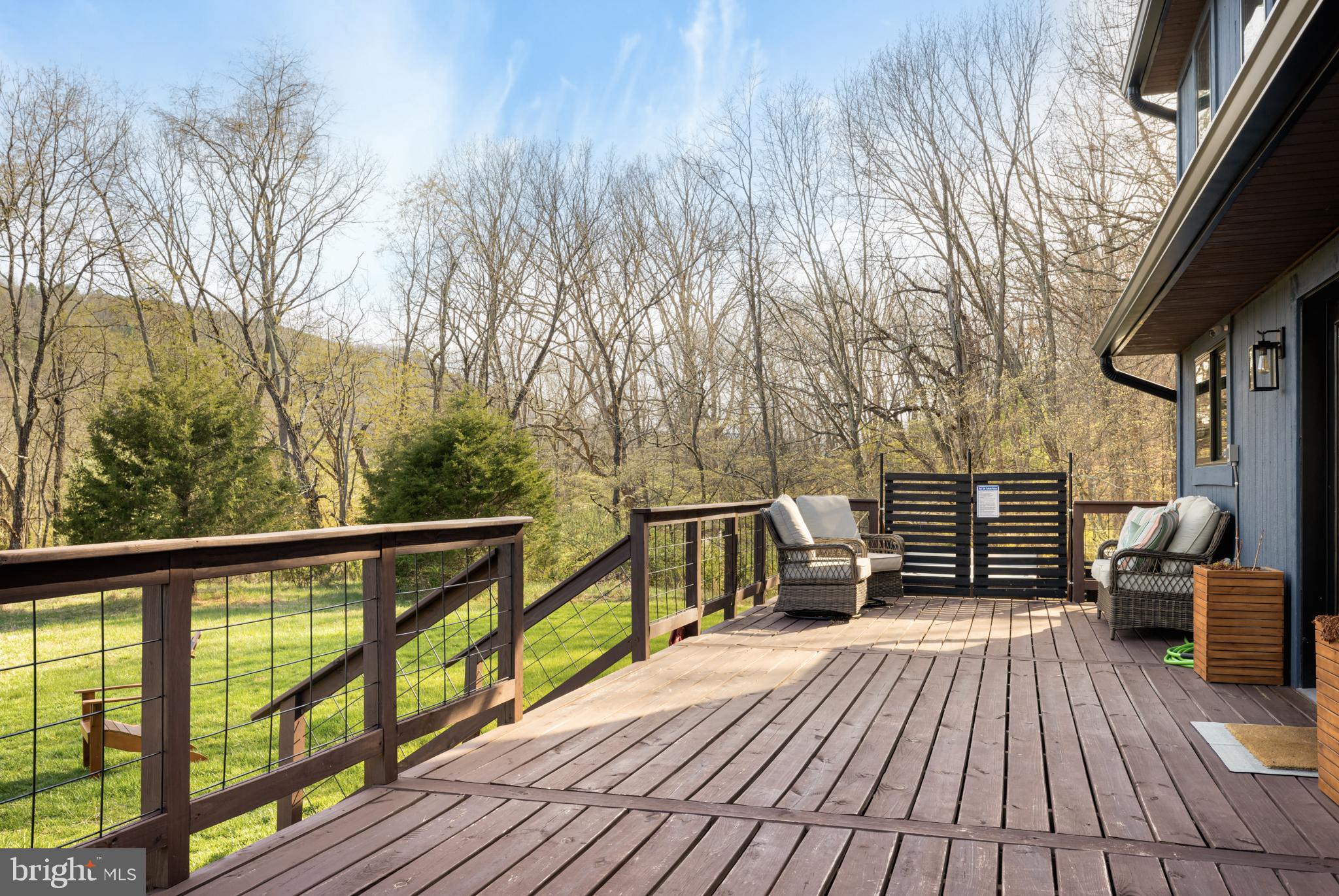 529 Posy Hill Road Lost City, WV 26810 - Photo 40 of 59 a view of balcony with wooden floor and outdoor space