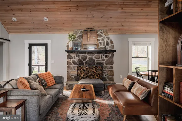 a living room with furniture and a couch