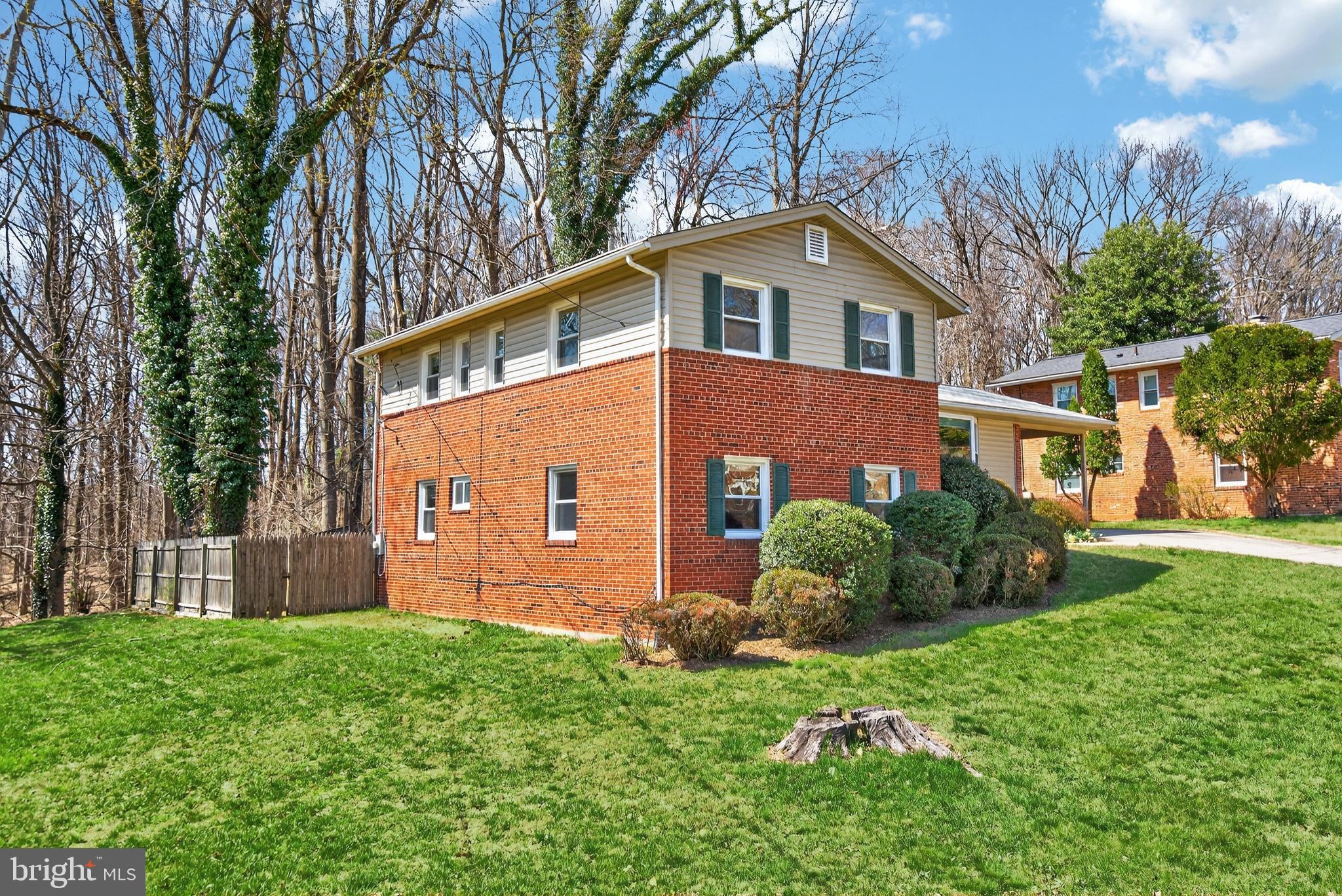 11004 Oakwood Street Silver Spring, MD 20901 - Photo 3 of 35 front view of house with a yard