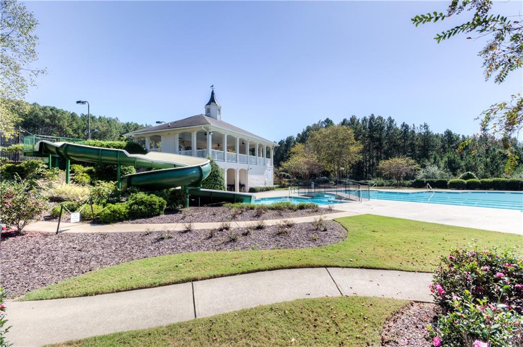 716 Conley Drive Canton, GA 30115 - Photo 7 of 9 a front view of a house with a yard