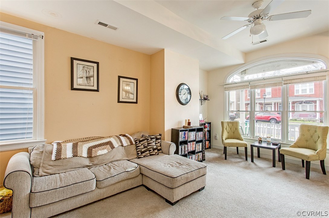 1317 Decatur Street Richmond, VA 23224 - Photo 2 of 18 a living room with furniture and a large window