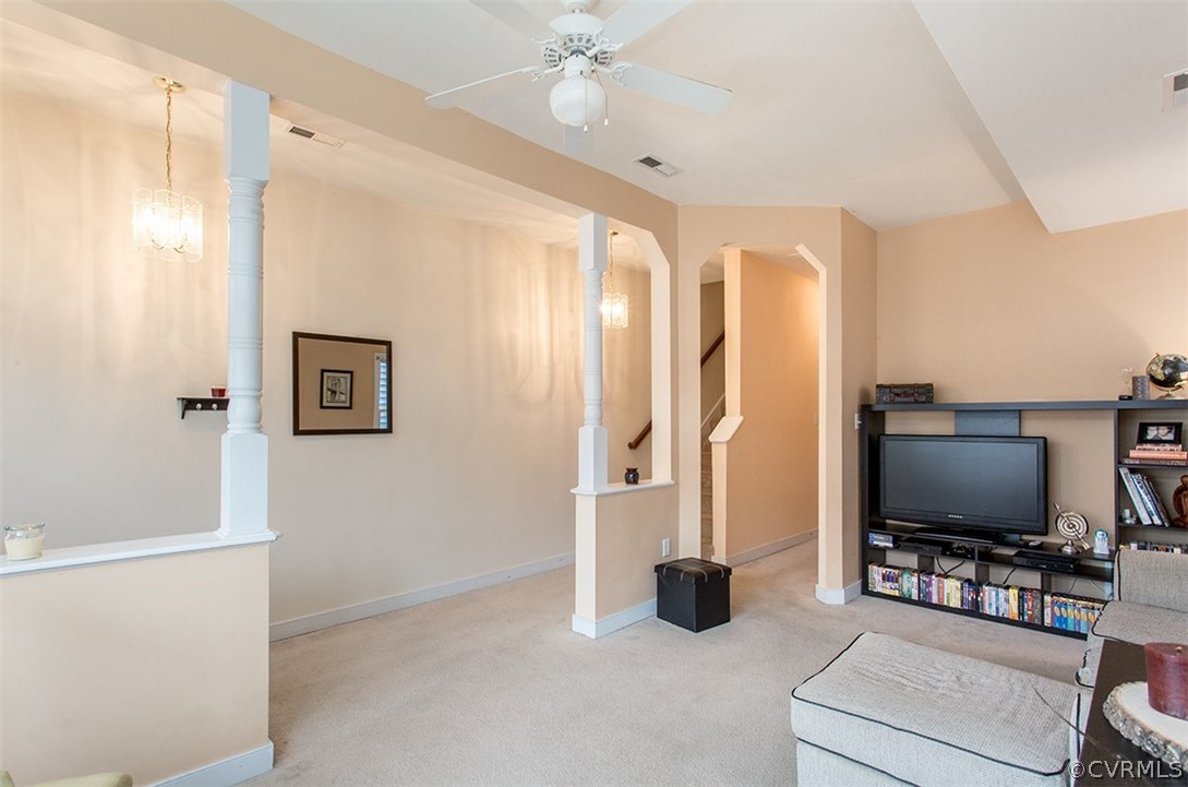 1317 Decatur Street Richmond, VA 23224 - Photo 4 of 18 a living room with furniture and a flat screen tv