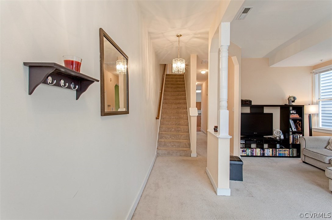 1317 Decatur Street Richmond, VA 23224 - Photo 5 of 18 a view of a hallway with living room and furniture