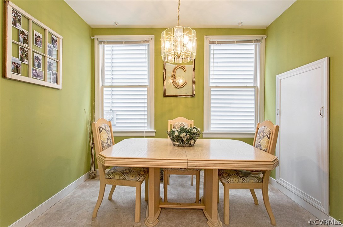 1317 Decatur Street Richmond, VA 23224 - Photo 10 of 18 a view of a dining room with furniture and window